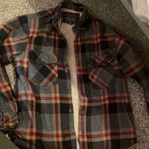 Flannel with Sherpa lining. Mens size medium. Fits like a womens Large.
